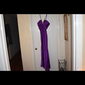 Formal floor length purple gown.